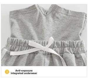 Dettaglio degli shorts in maglia grigia da bambina con coulisse e fodera integrata