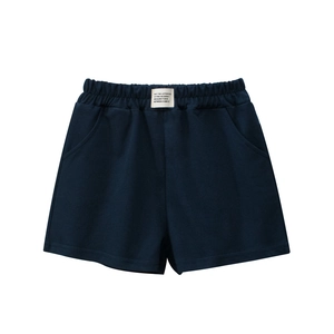 Girls' casual navy blue sports shorts with elastic waist and printed label design
