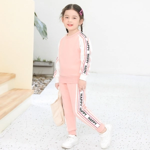 Completo autunnale da bambina due pezzi rosa e bianco con dettagli di nastri Happy