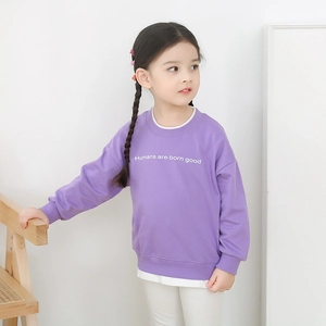 Girls purple long sleeve sweatshirt with white graphic print and layered hem style