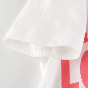 T-shirt fille blanc en coton avec imprimé lettres rouges et détails de couture aux manches