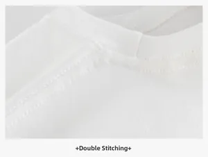 Detail of double-needle chain stitch on the white cotton T-shirt neckline