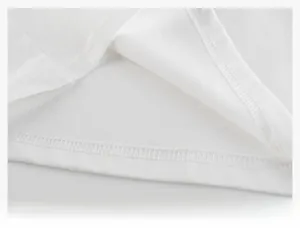 Detailed close-up of white T-shirt hem featuring professional double-needle stitching