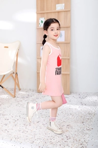 Detail of pink sleeveless cotton dress for girls featuring a red strawberry print pattern