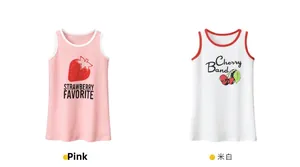 Detailed view of pink strawberry and cream cherry sleeveless cotton dresses for girls