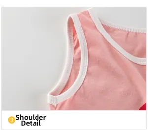 Detailed close-up of shoulder seam and piping on pink cotton girls tank dress