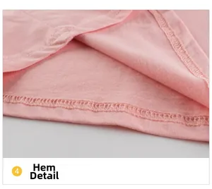 Detail of pink cotton knit dress hem showing professional double-needle stitching