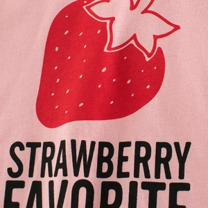 Pink cotton knitted dress for girls featuring a red strawberry pattern and graphic text