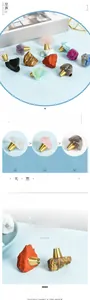 Detail of natural crystal cabinet handles with gold brass base in assorted gemstones