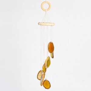 Hanging wind chime with natural yellow agate slices and wooden ring for home decoration