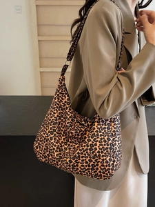 Stylish large leopard print canvas tote bag with adjustable shoulder strap and zipper