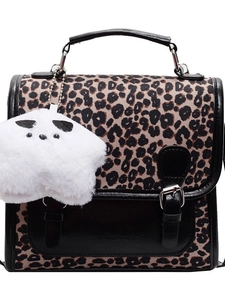 Versatile leopard print messenger bag with black faux leather trim and plush star charm