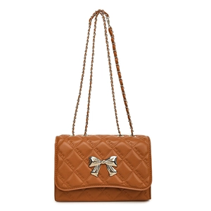 Brown quilted crossbody bag with golden bow hardware and leather chain strap in front view