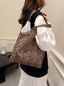 Large leopard print canvas tote bag for women showing spacious casual shoulder style