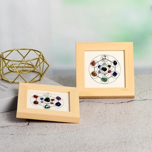 Metatron's Cube crystal wall art set in minimalist wooden frames with natural gemstones