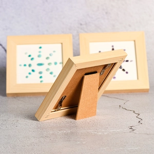 Minimalist square wood frame with sunburst gemstone pattern and back support stand