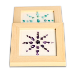 Modern wooden picture frame set featuring starburst patterns of natural crystal stones