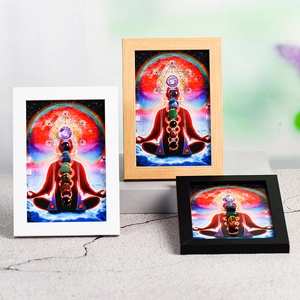 Three chakra meditation frames in black, white, and wood featuring healing energy stones