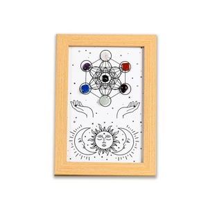 Chakra healing wall art in wooden frame with Metatron's Cube and seven polished gemstones