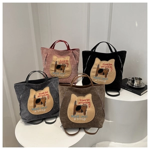 Various corduroy tote bags featuring cute cat embroidery and dual-purpose straps