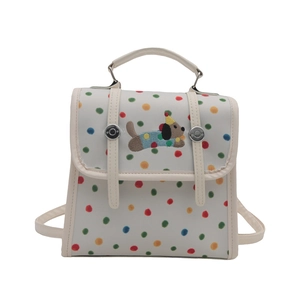 White polka dot backpack for girls with cute embroidered dog and silver buckles