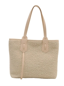 Borsa tote in morbido peluche color crema con manici in pelle vista frontale su bianco