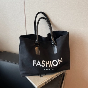 Large black canvas tote bag with Fashion Paris lettering and leather trim details