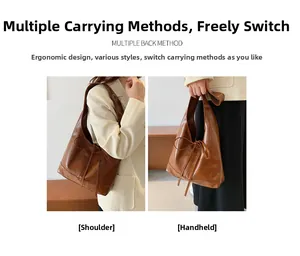Detail showing two ways to carry the brown leather tote bag as a shoulder or handbag