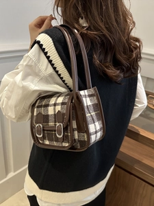 Vintage wool plaid shoulder bag for women in brown and cream colors with silver buckles