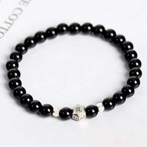 Bracelet en obsidienne avec perle du zodiaque Scorpion en argent et gravure de date