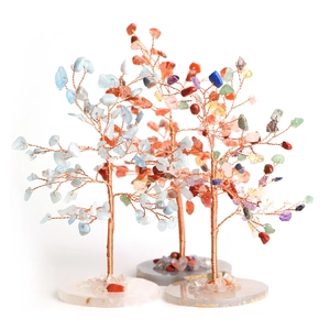 Three crystal tree ornaments with agate bases in amazonite, carnelian, and multi-color stones