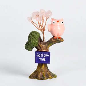Pink crystal money tree owl figurine with a wood-like base for home office decor