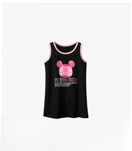 Detail of girls' black sleeveless dress with pink cartoon print and contrast neckline
