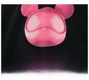 Detailed macro view of pink gradient printed graphics on a black cotton girls dress
