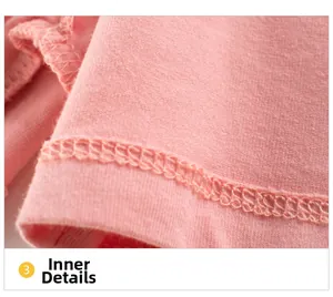 Close-up detail showing breathable pink cotton fabric with professional overlock stitching