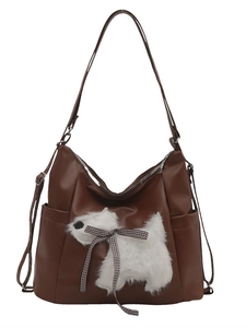 Brown PU leather shoulder bag with white plush dog motif and black-white plaid bow decoration