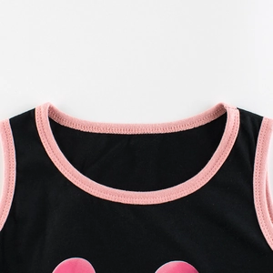 Girls black cotton tank dress with pink ribbed crew neck and round print details