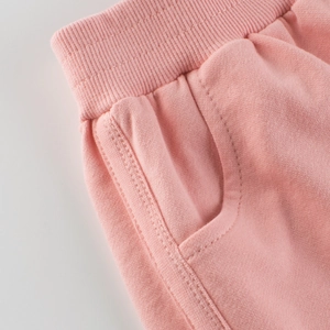 Rosa Kinder-Baumwollshorts mit elastischem Rippbund und seitlichen Taschendetails