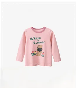 Detail of light pink long sleeve t-shirt showing cartoon bear print and tulip graphics