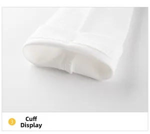 Vue détaillée des poignets en coton blanc cousus pour t-shirts à manches longues enfant