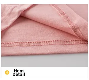Detail shot of the hem showing professional double-needle stitching on pink cotton top