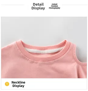 Detail shot of the pink cold shoulder neckline on a girl's knit cotton long sleeve top
