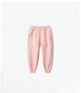 Pink kids jogging pants with heart-patterned side stripes and elastic waist
