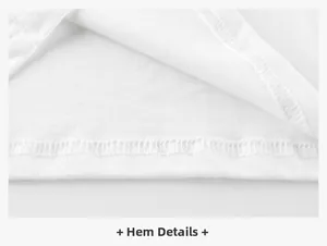 Detailed close-up showing the precise double-needle stitching on the white cotton t-shirt hem
