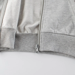 Sweat à capuche zippé gris clair pour enfant en molleton de coton avec ourlet côtelé