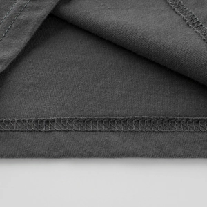 Close-up of charcoal grey cotton long sleeve T-shirt showing double needle hem stitching