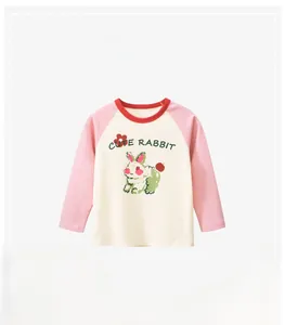 Detail of child long sleeve t-shirt with pink raglan sleeves and cute rabbit print