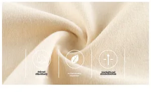 Close-up of soft beige knit fabric showing breathable texture and Class A quality detail