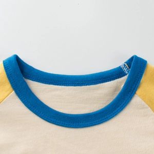 Girls' raglan sleeve long sleeve t-shirt with yellow and white contrast and blue ribbed collar