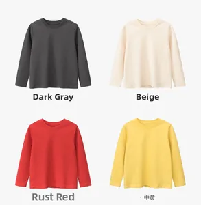 Kids long sleeve crewneck t-shirts in dark grey, apricot, rust red, and mustard yellow